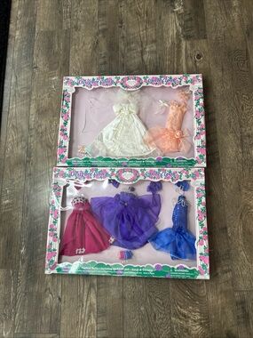 Vintage Designer Gown Collection Doll Dresses new with one outfit missing
